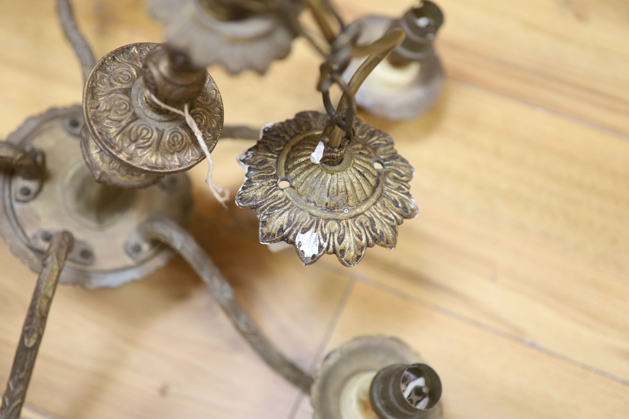 An Art Deco brass and opaline pendant light and a gilt five branch Victorian style chandelier (2)